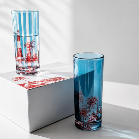 The Bombay Tide Glasses styled with a Bombay Gothic gift box showing the coastal toile artwork